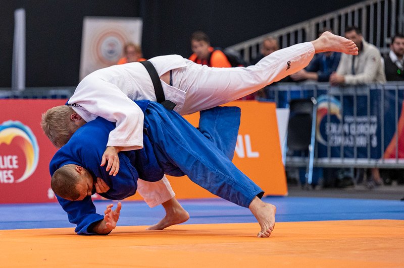 One judoka throwing another