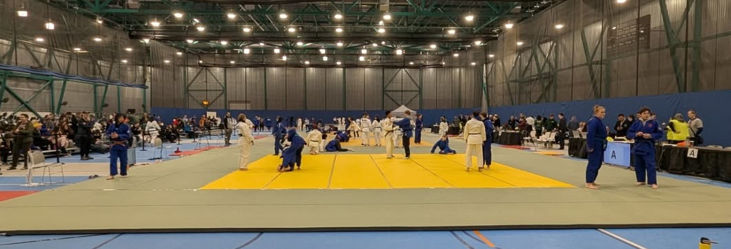 Athletes warm up at the Sask Open