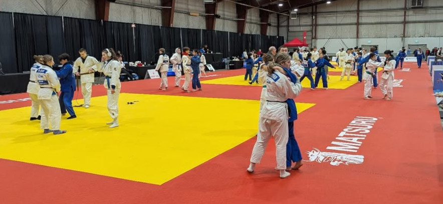 Athletes warming up at the Pacific International shiai